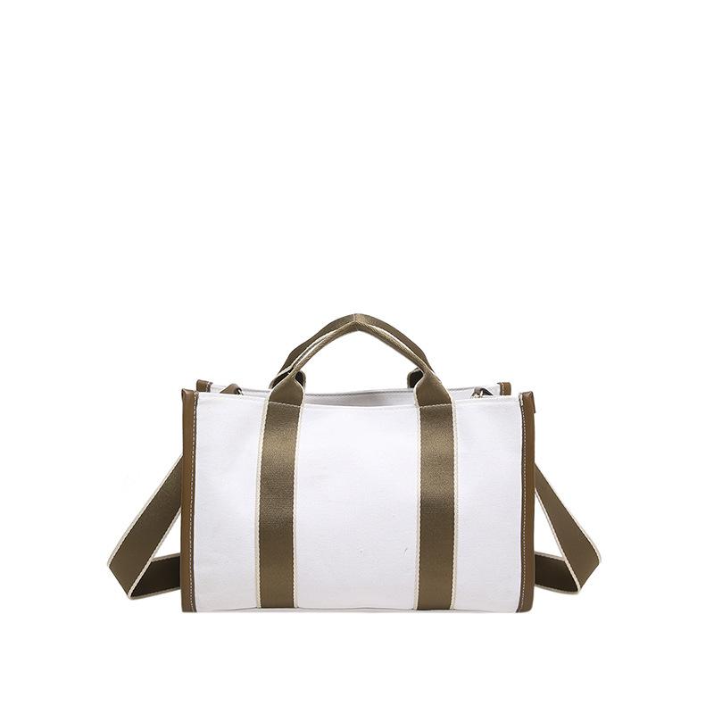 

Spring new fashion, large-capacity portable canvas bag commuter shoulder bag contrasting colors