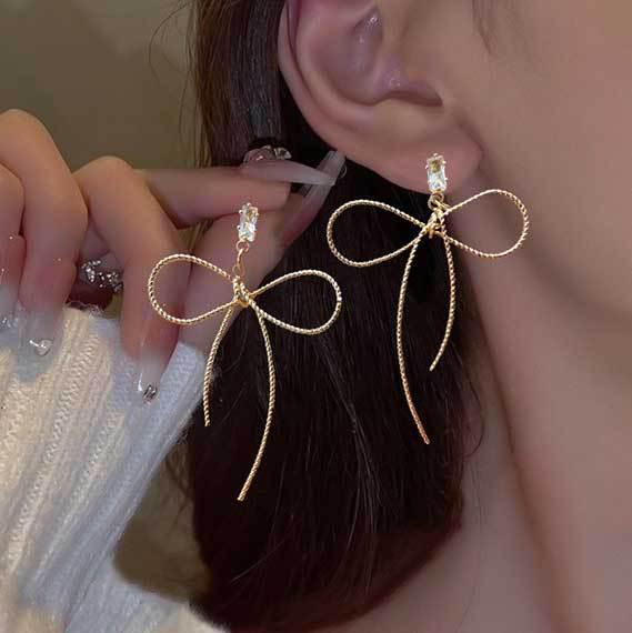 Koreanischer Stil Nicht-Piercing Ohrclip mit langem Quaste, Perlmutt Schmetterlings Design für Damen - High-End, Coole Mode.