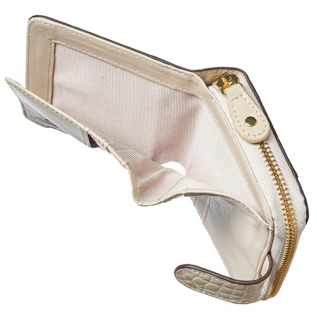 HENLY COAT - Italian Crocodile-Embossed Cowhide Leather by Greta Fix. Featured In Anan Magazine: "It Looks Like a Mini Wallet, But Inside It's a Long