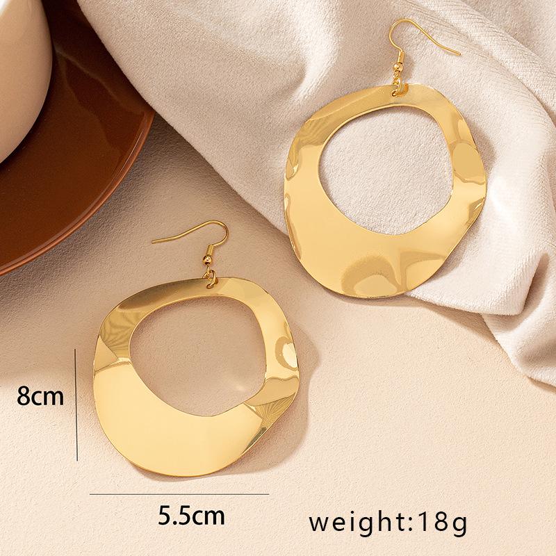 

Elegant Women s Geometric Circle Earrings with Irregular Stud Design