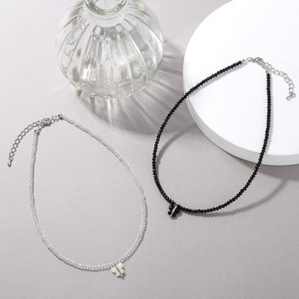Black and white butterfly bead necklace