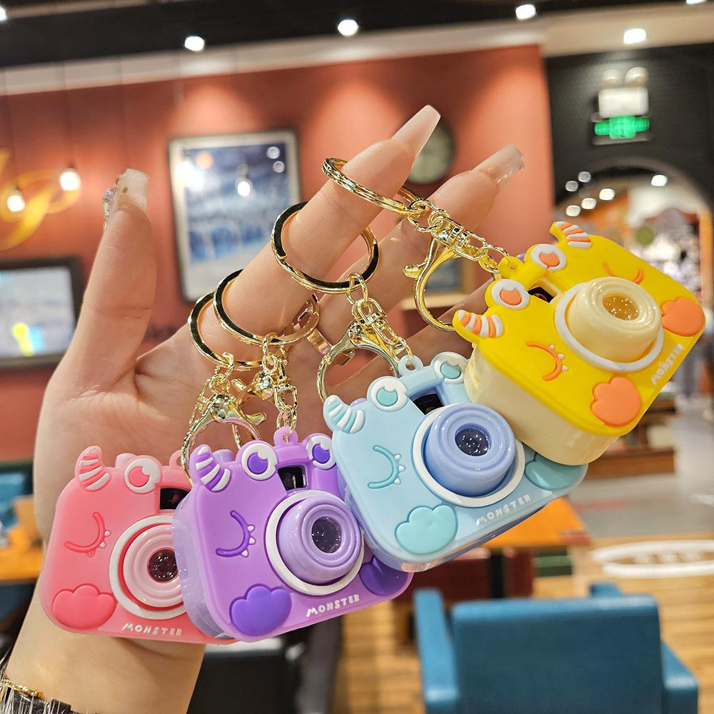 Niedliche Mini-Projektionskamera Cartoon Leuchtendes Projektionslicht Damenhandtasche Schlüsselanhänger Anhänger