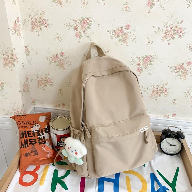

Trend fashion student bag large capacity middle school simple casual backpack solid color nylon backpack single package