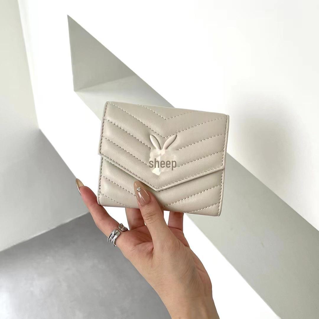 

Женский складной кошелек из натуральной кожи с отделениями для карт, отделением на молнии, держателем для удостоверения личности и большой вместимостью для женщин. белый