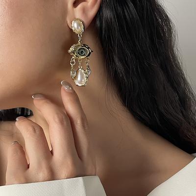 New Unique Design Eye Tassel Water Drop Pearl Earrings Vintage High Grade Facial Features Ear Jewelry For Women