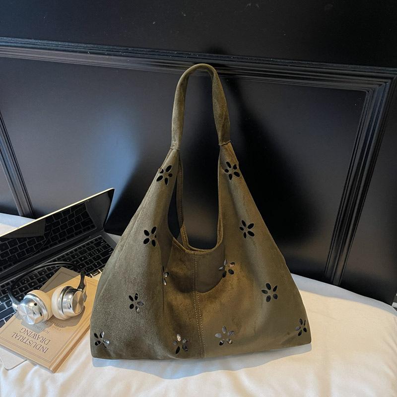 New bag women's casual hollow shoulder bag women's commute to work underarm bag literary and artistic fan tide