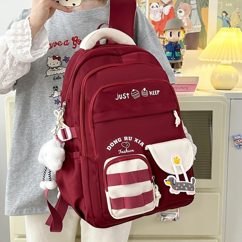Simplified And Cake Letter Printed Student Casual Backpack With Plueh Pendant