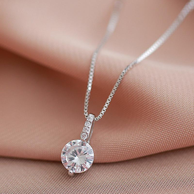 Geometric Light Luxury Water Drop Necklace: Simple Single Diamond Pendant for Women