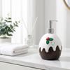 Kreative Eiform-Spenderflasche mit lächelndem Gesicht und dekorativem Blattdesign für den Tisch zu Hause Küchen-Badezimmerzubehör