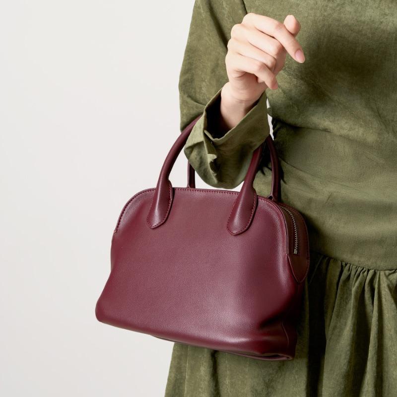 Simple High-end Commuter Bowling Handbag Niche Design Leather Women's Shell Bag