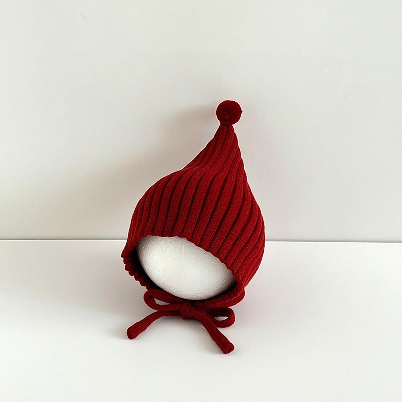 

Милая детская зимняя шапка с защитой ушей, однотонная, вязаная шапка с помпоном и завязками, ветрозащитная, теплая, для младенцев и малышей, шапка-бини с наушниками вино красного