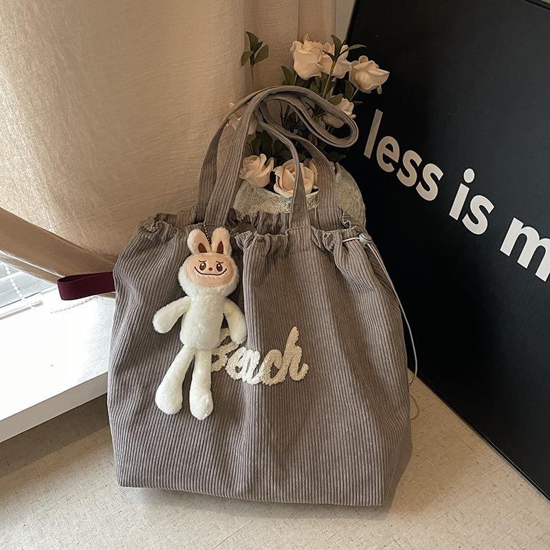 

New autumn and winter large-capacity corduroy pure cotton shoulder bag versatile student tote bag letter embroidery no pendant серый