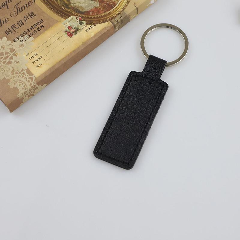 

1 шт. двухсторонний брелок из искусственной кожи для автомобиля, небольшой подарочный металлический кулон из искусственной кожи, однотонный автомобильный брелок, простые брелки для ключей чёрный