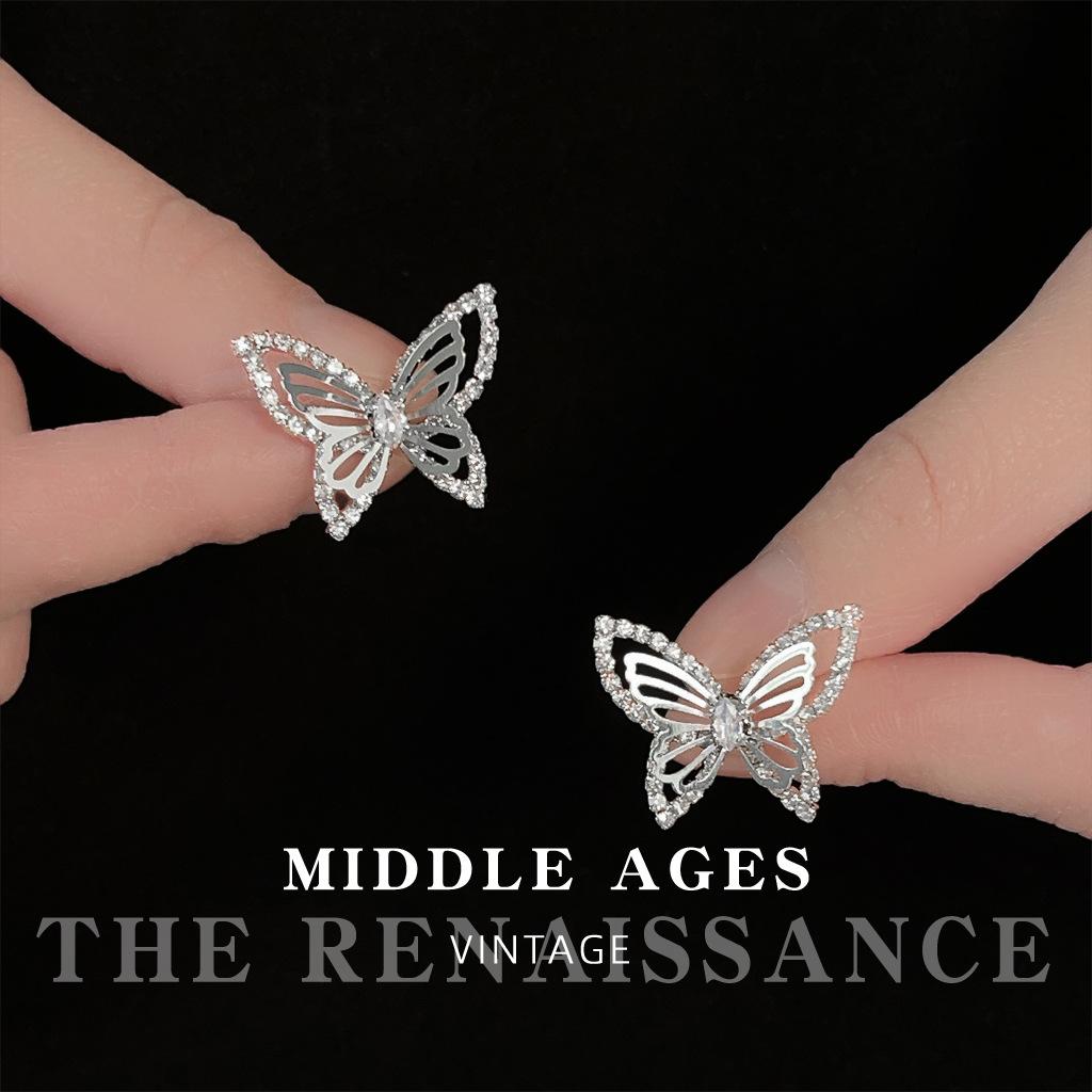 Medieval hollow butterfly zircon stud earrings French style cold wind earrings literary earrings