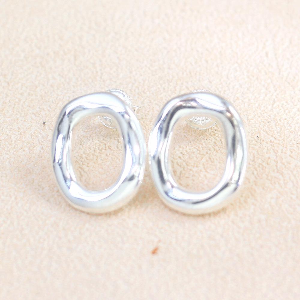 UNOde50 Gold and Silver Geometric Stud Earrings - Elegant Light Luxury Design