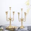 Iron Candelabra Tapers Candle Holders Candlestick Centerpieces with Five Candle Positions, a Golden Finish, and Formal Dinner or Ceremony Table