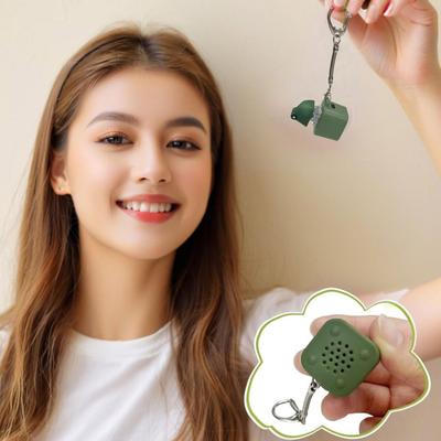 Chaveiro Brinquedo Fidget Sapo Coaxando com Luzes Coloridas Recarregável Aliviador de Estresse