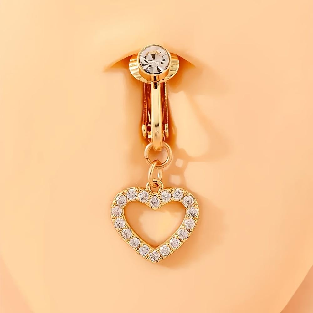 

Элегантный клип для пирсинга пупка в форме сердца, не требующий прокола, с кубическим цирконием, идеально подходящий для свадеб и повседневной носки. золотистый