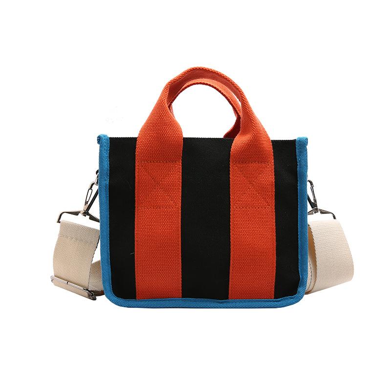 

Модные контрастные цвета Новый нишевый дизайн Холщовая сумка Многофункциональная магнитная застежка Повседневная универсальная наплечная сумка Тренд оранжевый