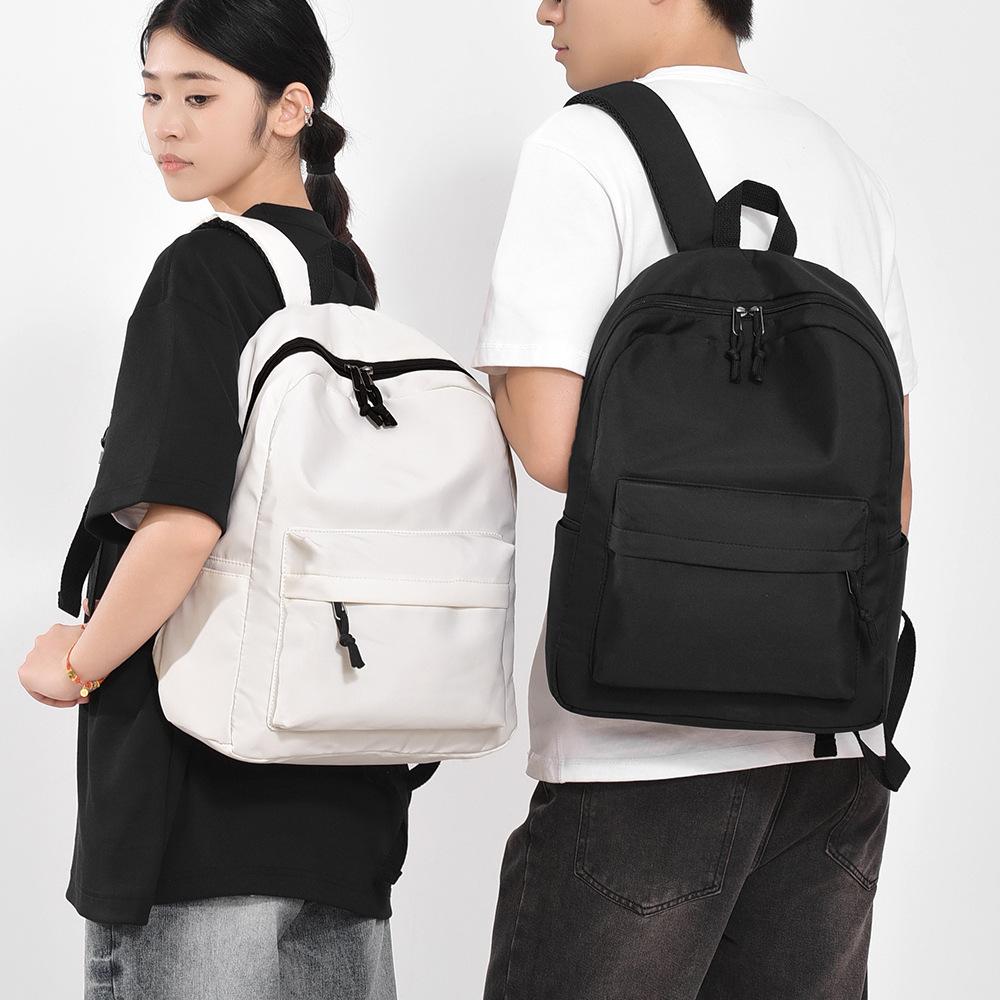 Solid color backpack fashion trend men's and women's backpack simple large capacity backpack student schoolbag casual backpack