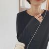 Women's Long-Sleeve White T-Shirt: Loose Fit, Korean Style, Round Neck Solid Color, Ideal for Early Autumn and Spring.