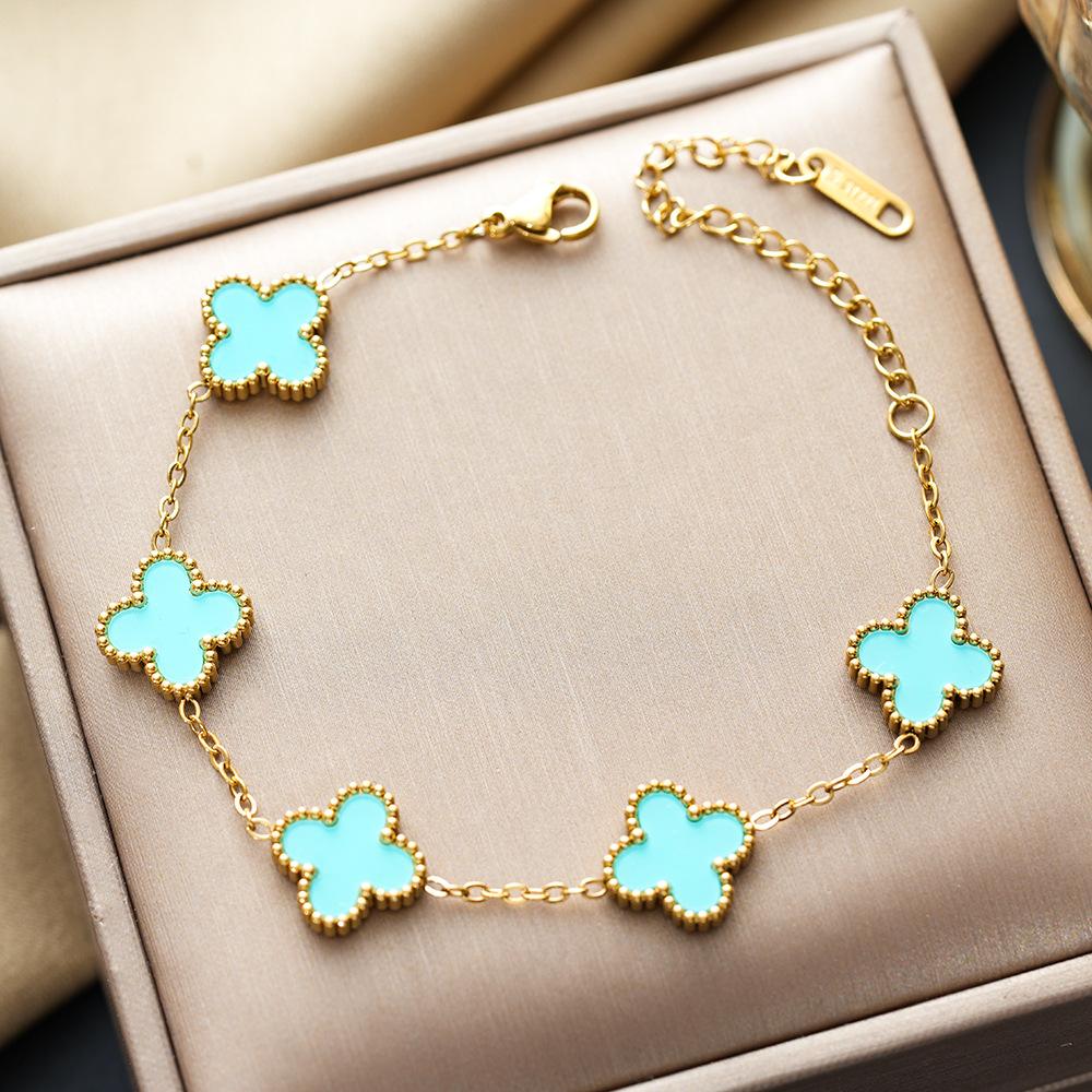 

Женский браслет из титановой стали с разноцветным клевером