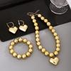 Elegant Heart-Shaped Earrings and Geometric Bracelet with Heart Pendant Necklace Set