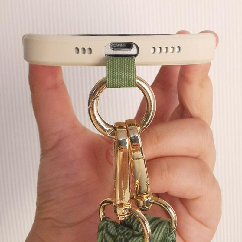 Correa ajustable para teléfono móvil de 20 mm y 33,5-60 cm con pestaña de sujeción.
