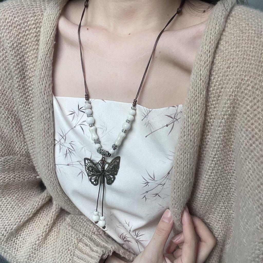 Bohemian Ethnic Style Long Bow Metal Necklace with Vintage Distressed Pendant (2025)