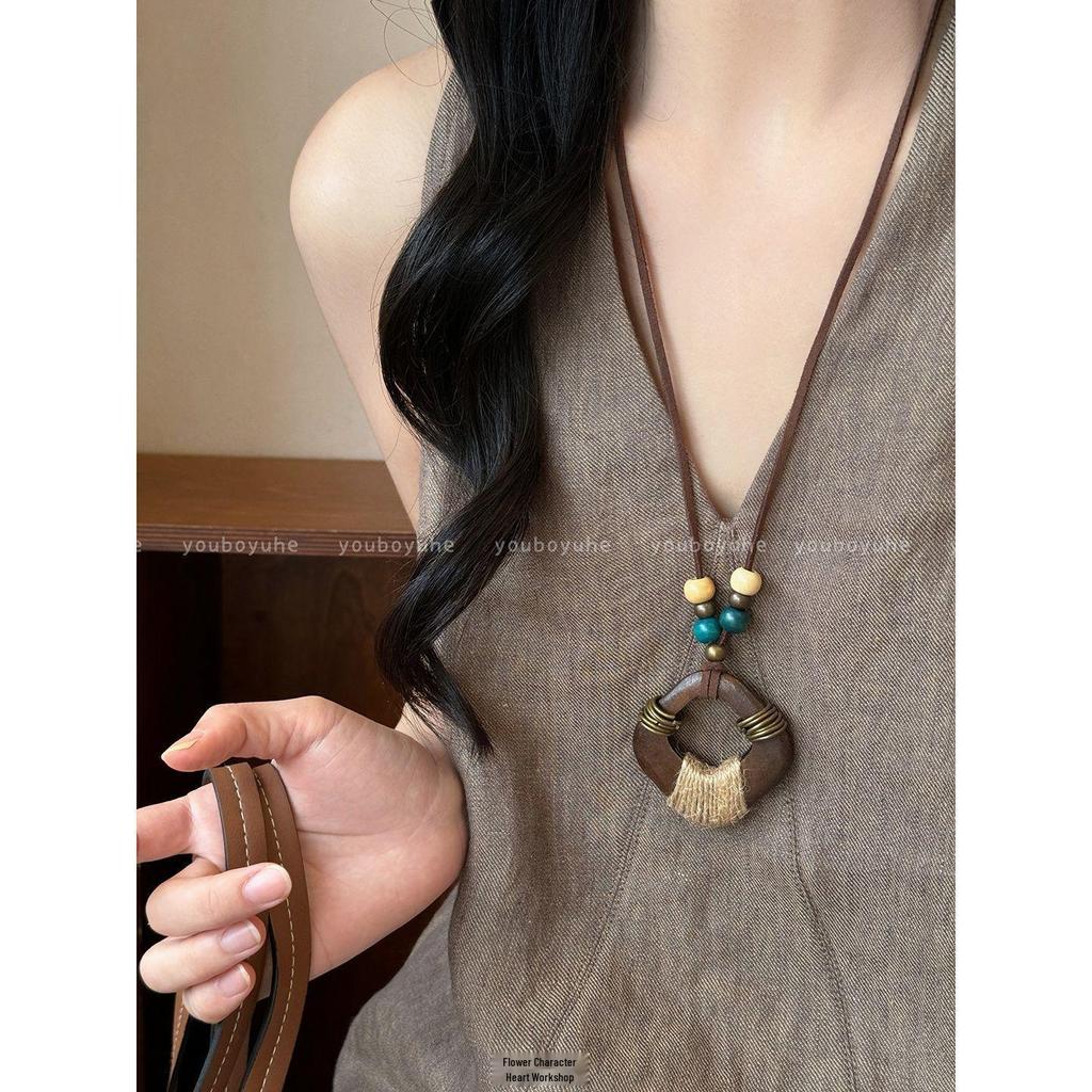 Retro Tassel Sweater Chain: Bohemian Flower Pendant Necklace for Women