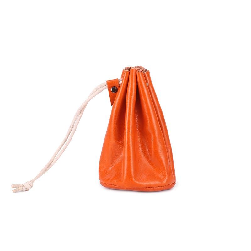

Japanese creative change bag female, retro oil wax cowhide multi-functional small coin lipstick storage cute earphone bag