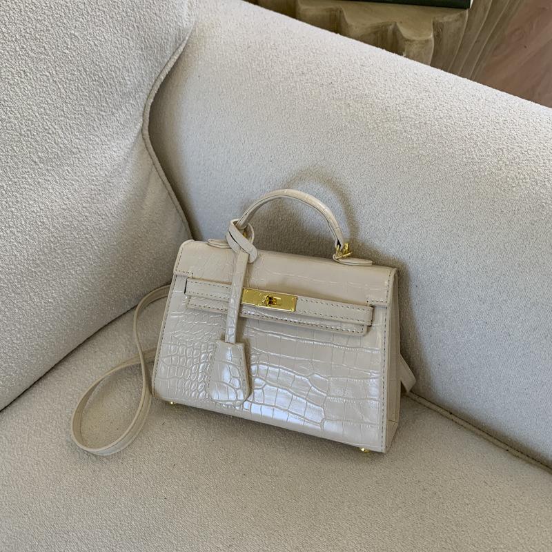 Hand-held small bag women's versatile 2025 new autumn and winter fashion texture cross-body small bag high-end shoulder bag