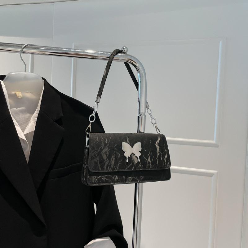 

Premium new temperament armpit bag women s solid color bow versatile commuting going out fashionable personalized shoulder bag чёрный