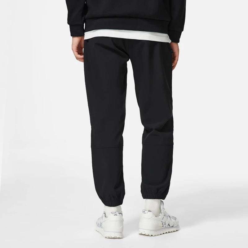 Li Ning Wade Series Solid Color Fleece Warm Loose Cuffed Sports Pants Men Bottoms Black AYKSA85-1
