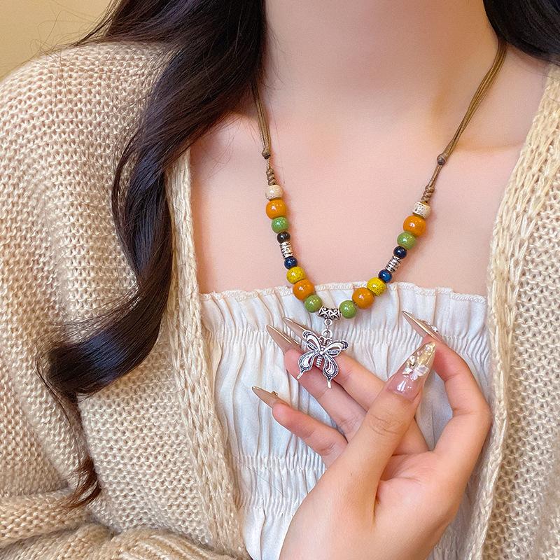 New Chinese retro national style butterfly necklace women s long fringed beaded collarbone chain accessories