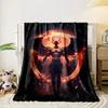 Fiery winged figure with a glowing circular flame backdrop. for all seasons blanket lunch break throw gift