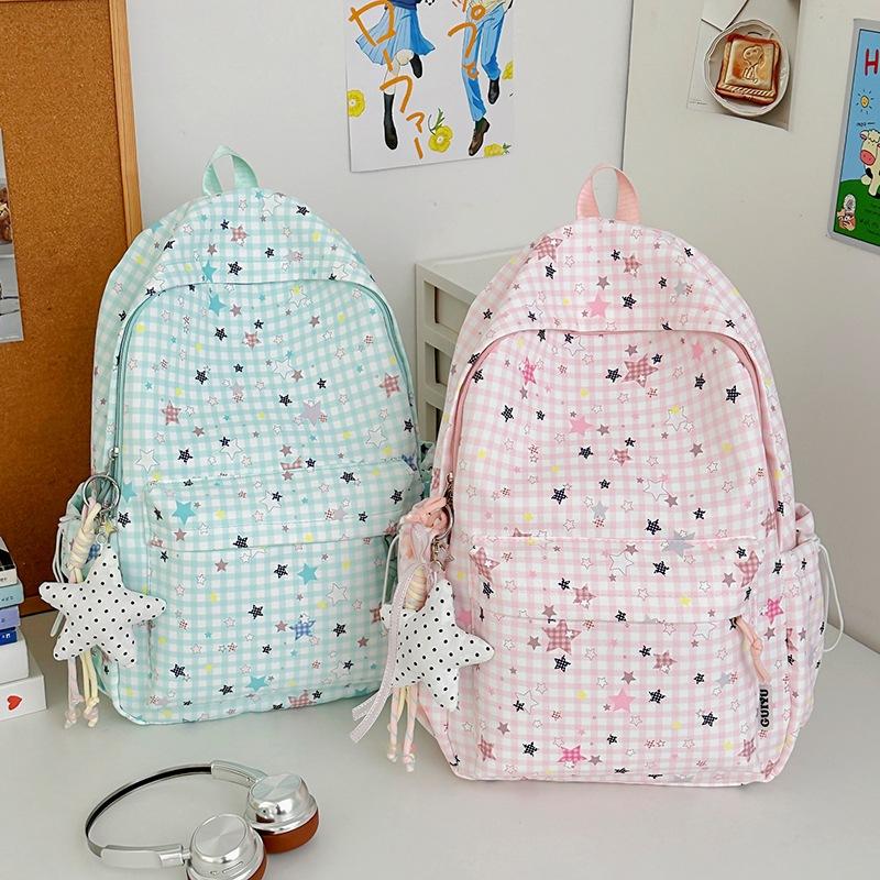 Schoolbag schoolbag female junior high school high school student star printing Korean version niche ins backpack Mori college student computer bag