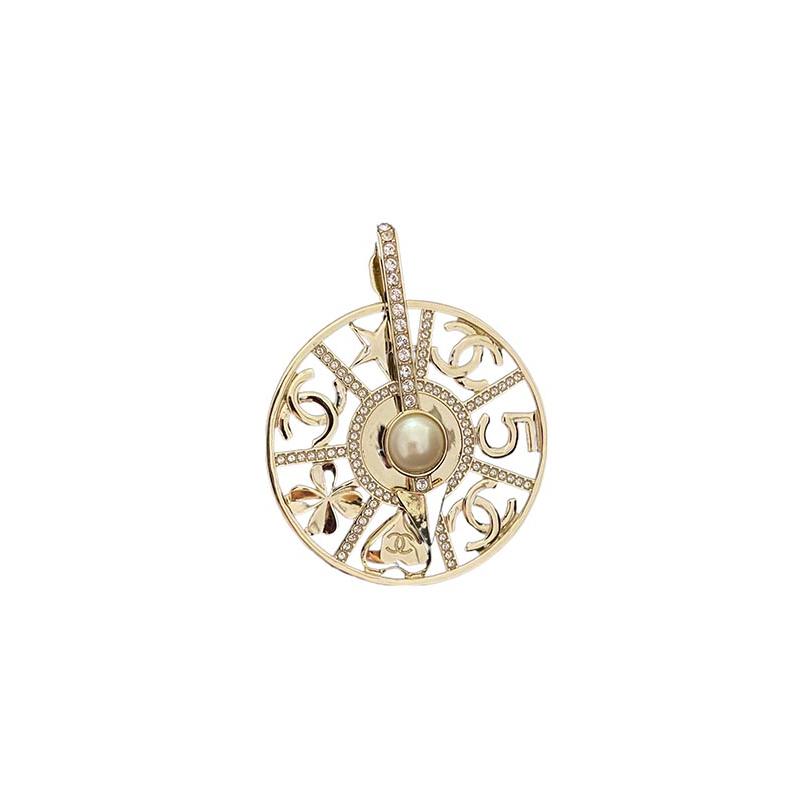 

CHANEL turning compass brooch gold золотий