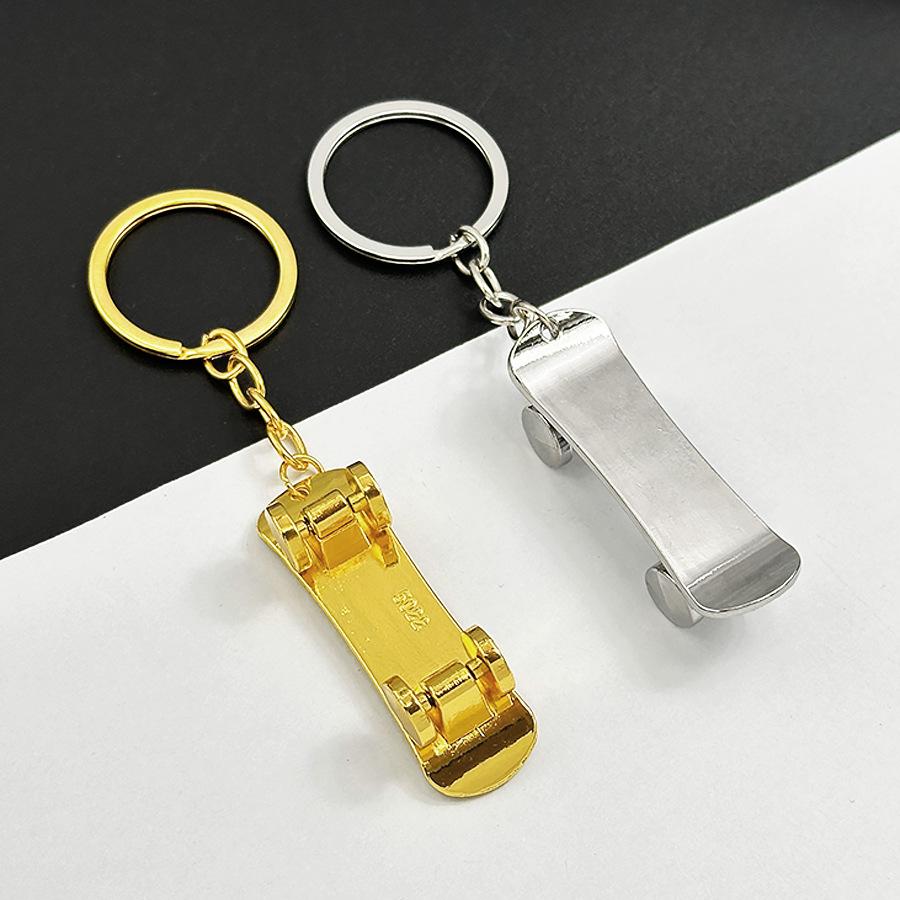 Creative Movable Metal Finger Skateboard Keychain: Rolling Miniature Cart Pendant Ornament