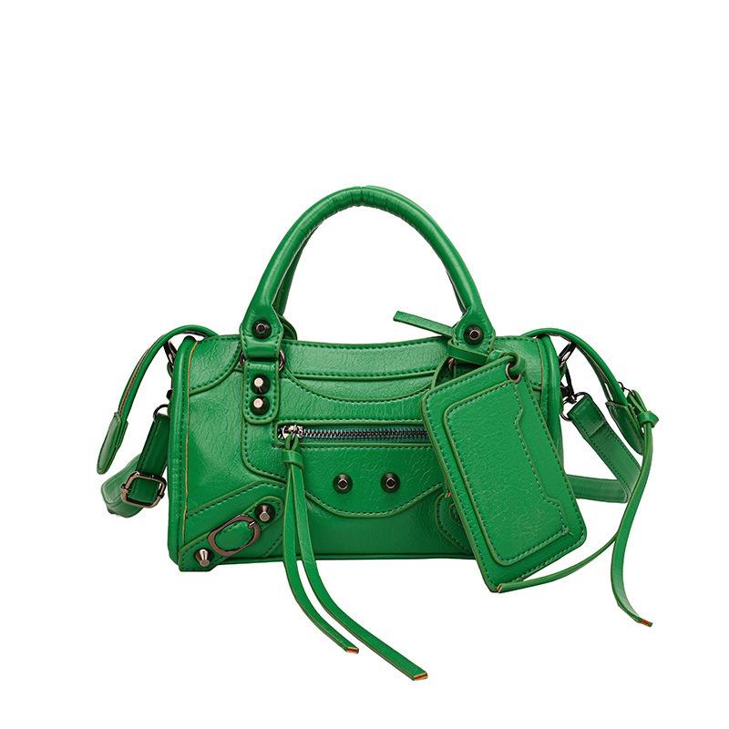 Premium känsla nisch handväska dam ny retro mode liten fyrkantig väska nit dekorativ lokomotivväska