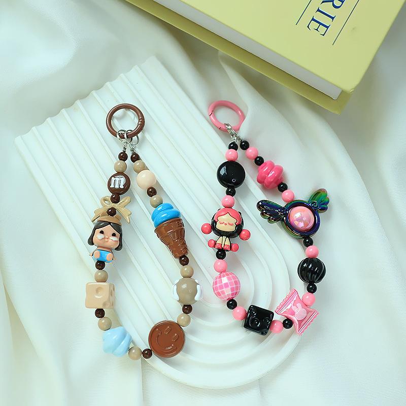 Roztomilá kreslená panenka s korálkovým popruhem na telefon, řetízkem na batoh, přívěskem na klíče, přívěskem proti ztracenému telefonu, dárkem pro iPhone, Samsung a dívku