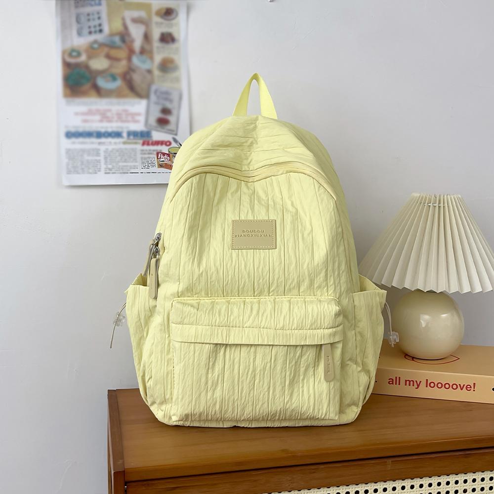Lightweight schoolbag female college student niche design simple and versatile backpack primary and secondary school students casual travel backpack