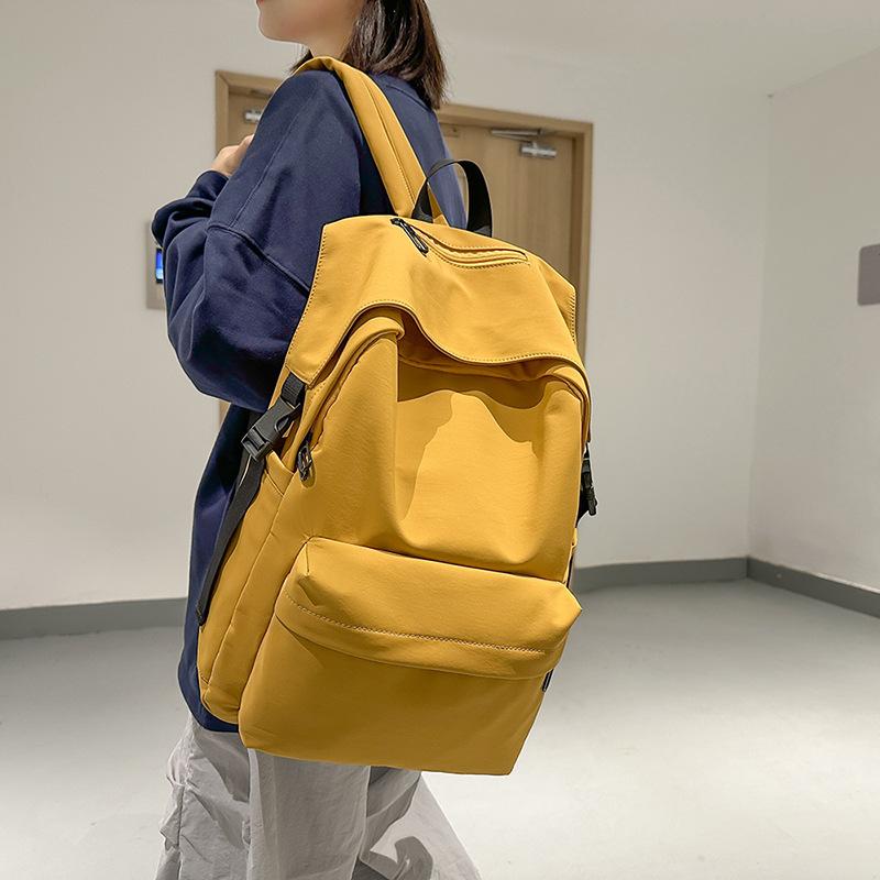 Einfacher einfarbiger vielseitiger Rucksack trendige Mode hoher Wert Campus-Stil Rucksack große Kapazität Studentenrucksack