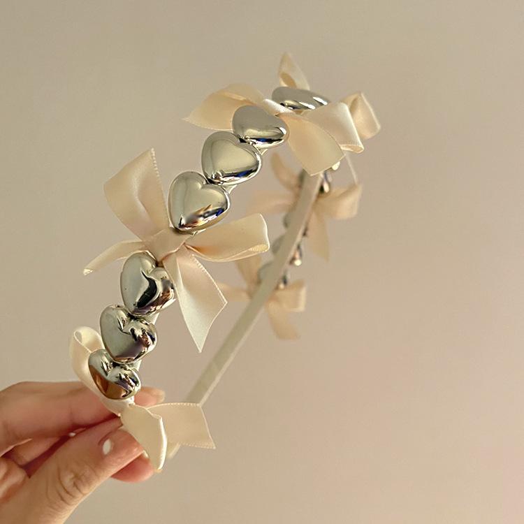 Bågar i koreansk stil Hårband hår kvinna metall hjärta fjäril hårrosetter flickor band mångsidiga enkla fina pannband accessoarer