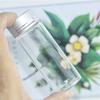6 mini glass bottles with silver aluminum lids and white plastic bottoms. Perfect for seasoning, making wishes, or drifting. Silver aluminum lid - 40m