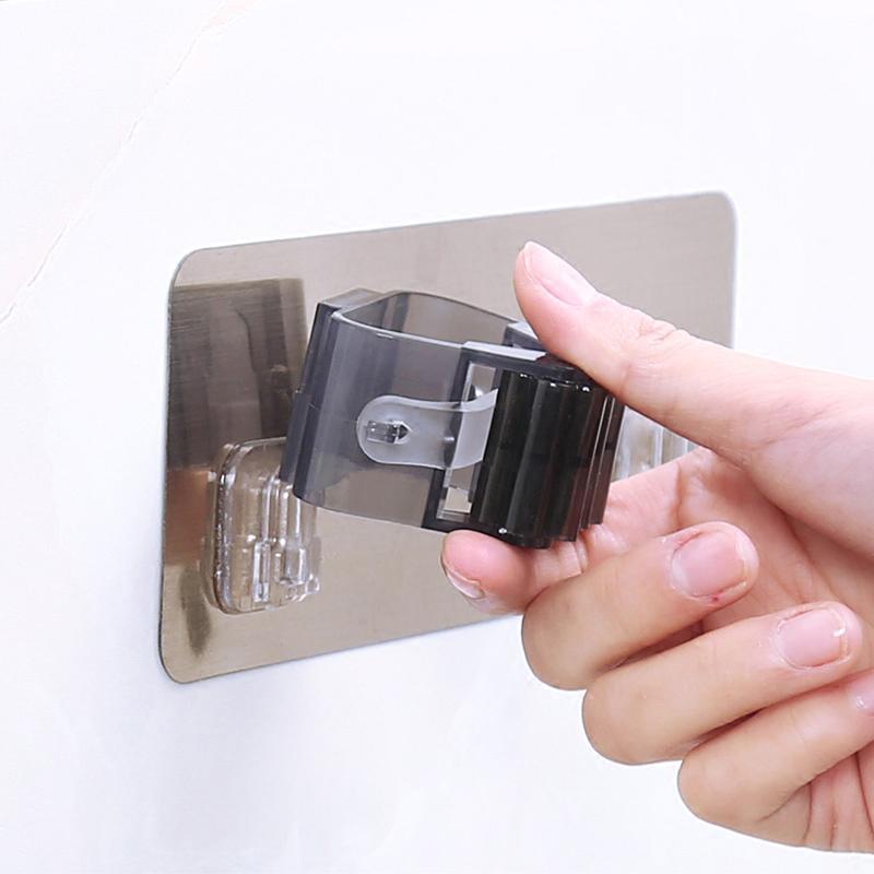 Hemtillbehör Dubbelspänne Sömlös väggmonterad mopphållare förvaringsställ