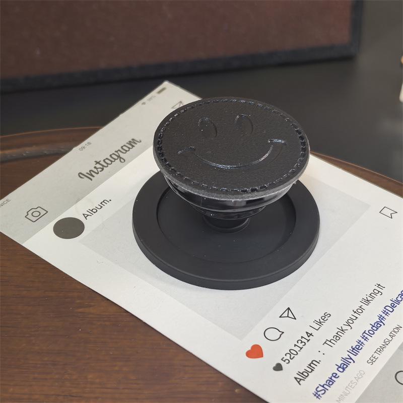 Dopamine Solid Color Leather Texture Smiley Face MagSafe Airbag Phone Holder