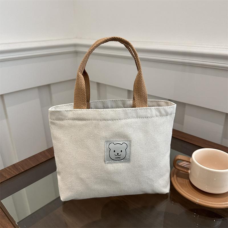 Women's bag niche design canvas tote bag Bento bag versatile commuter portable to work portable small