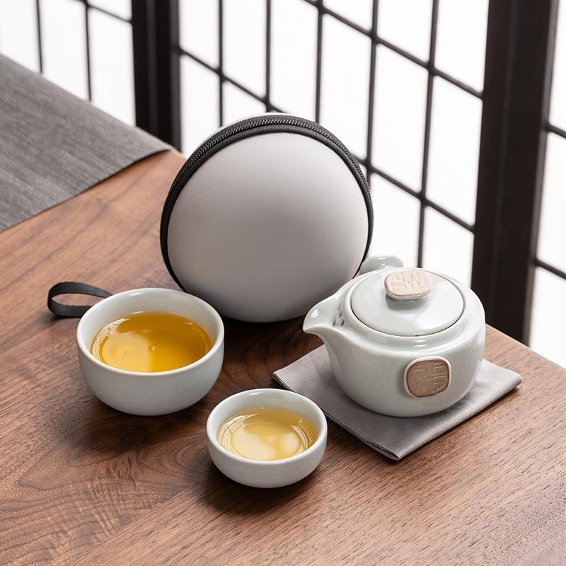 Ru kiln travel tea set, high-end one pot and two cups, open film can be raised, light luxury business holiday commemorative gifts