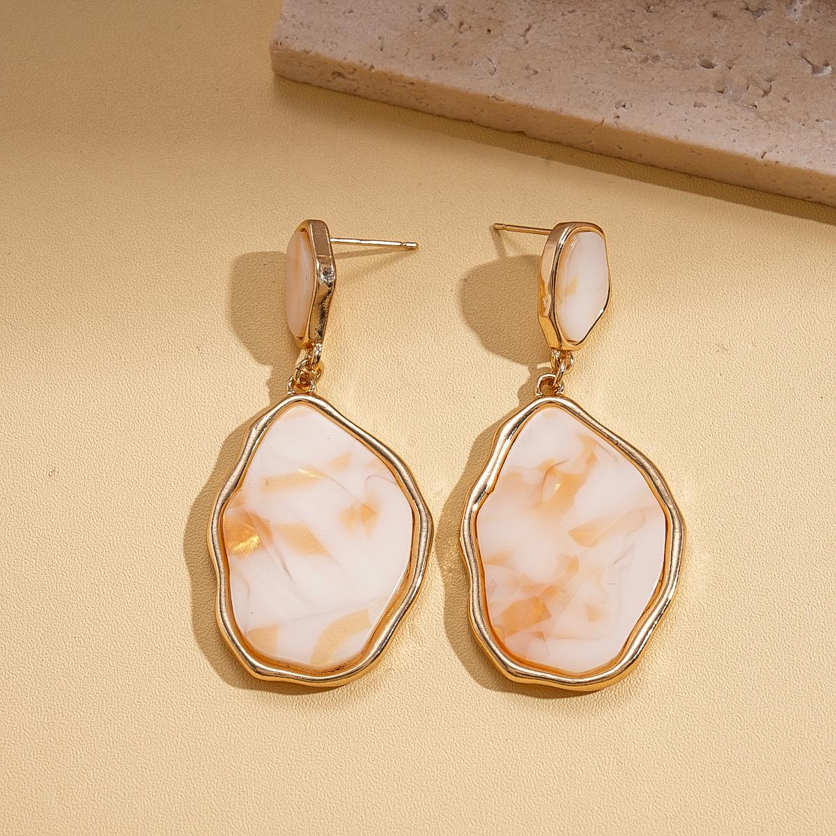 Plate smudged irregular oval silver needle earrings vacation style geometric fashion sense earrings